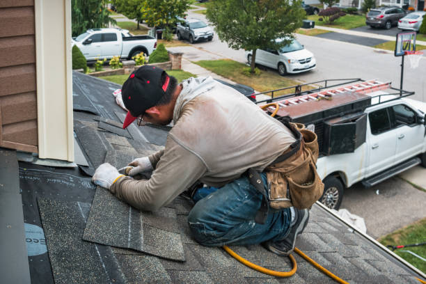 Professional Roofing technician working in Brightwood, OR